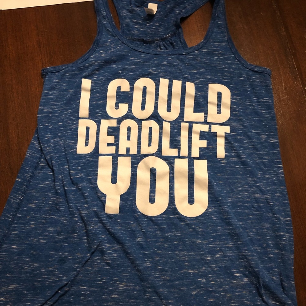 Blue racer back tank. “I can deadlift you “
